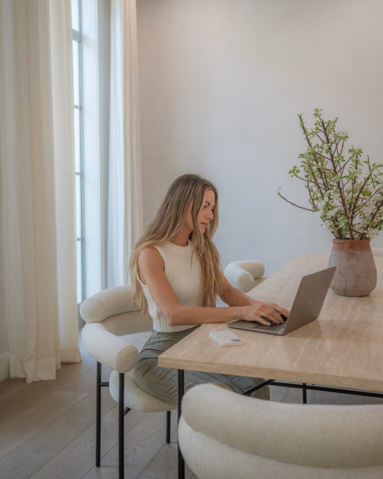 woman typing on computer