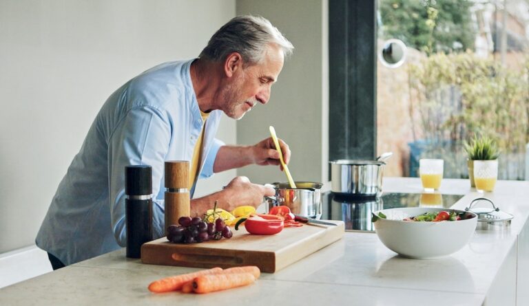 man cooking healthy