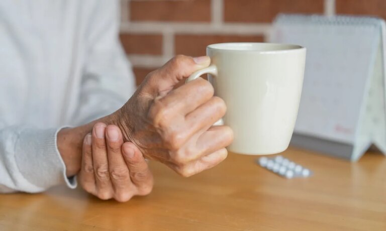 woman holding coffee mug