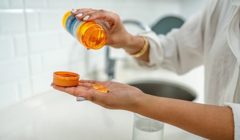 woman taking vitamins